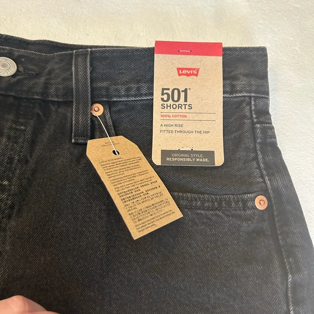 Levi’s NWT black 501 original fit high rise distressed black denim jean shorts